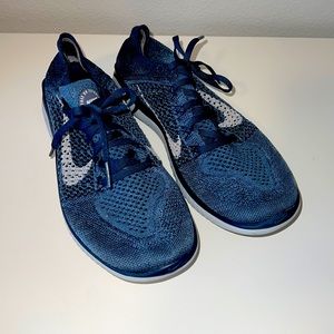 EUC Nike Flyknit running shoes.